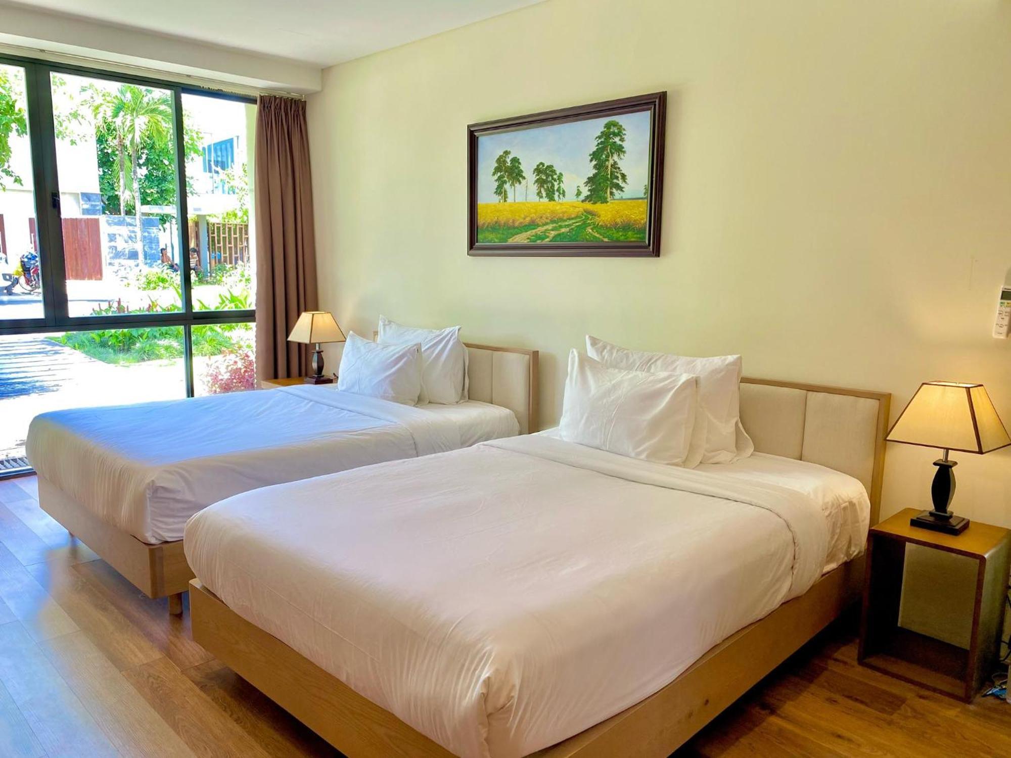 Luxury Dana Beach Resort & Spa دا نانغ الغرفة الصورة